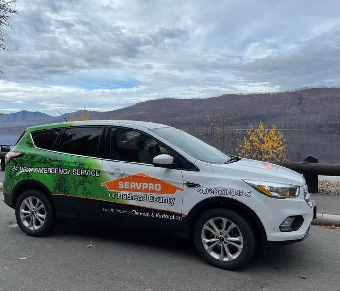 SERVPRO car on the side of the road in front of mountains
